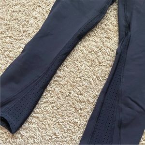 Lululemon black crop legging with see through calf cut-outs! 20” inseam, size 4